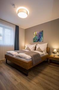 Postel nebo postele na pokoji v ubytování Gasthaus Rech