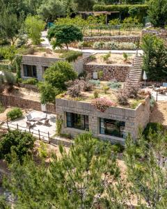 an aerial view of a house with a garden at Blue Jay Valley in Jezzîne