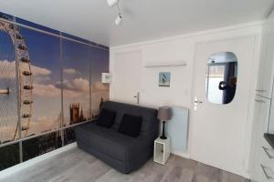 Posedenie v ubytovaní Appartement T2 à 500m de la plage et du marché.