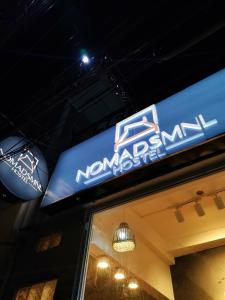 Certificato, attestato, insegna o altro documento esposto da NomadsMNL Airport Hostel