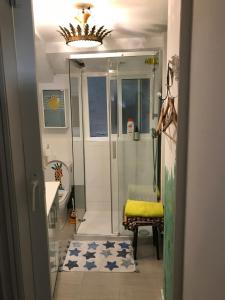 a bathroom with a shower and a sink at Apartamentos La Selva in Cádiz