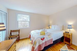 Postel nebo postele na pokoji v ubytování Corner Cottage
