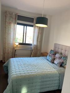 Łóżko lub łóżka w pokoju w obiekcie Paz y tranquilidad, a un paso de Sevilla