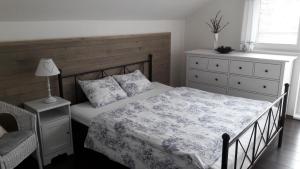 Posteľ alebo postele v izbe v ubytovaní Chata Bellago