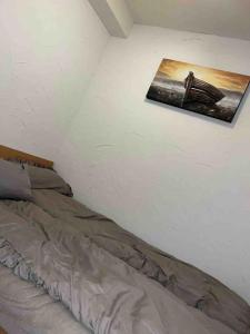 En eller flere senge i et værelse på Wolke7