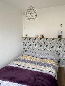 Posteľ alebo postele v izbe v ubytovaní Super appartement cosy, parking privé