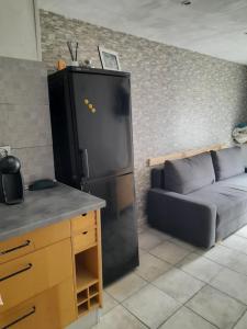 Kuchyňa alebo kuchynka v ubytovaní Maison à 1 minute de la plage