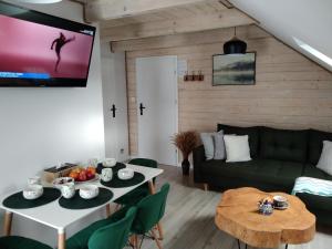 Posedenie v ubytovaní Apartamenty Równia 2