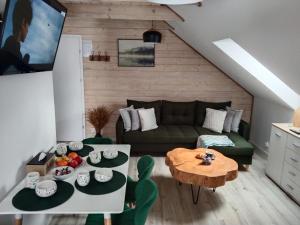 Posedenie v ubytovaní Apartamenty Równia 2