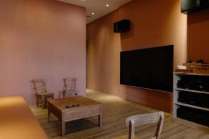 TV/Unterhaltungsangebot in der Unterkunft 輕塵別院Serenegray B&B