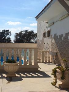 Μπαλκόνι ή βεράντα στο Villa with pool in Punta Prosciutto, 120 m², play area +8 φωτογραφίες