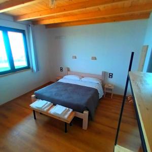 Agriturismo Incanto della Natura客房内的一张或多张床位