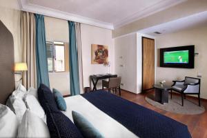 TV a/nebo společenská místnost v ubytování Park Suites Hotel Luxury Boutique Hotel