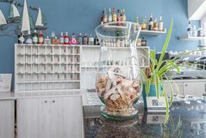 A kitchen or kitchenette at HOTEL CONTI