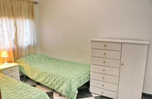 Posteľ alebo postele v izbe v ubytovaní Apartamento Plaza la Fuente