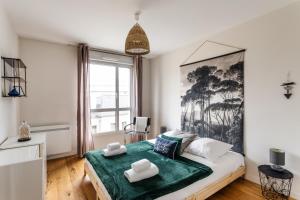 Posteľ alebo postele v izbe v ubytovaní Le ViLoNa - T3 moderne avec parking privé