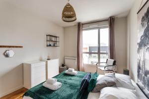Posteľ alebo postele v izbe v ubytovaní Le ViLoNa - T3 moderne avec parking privé