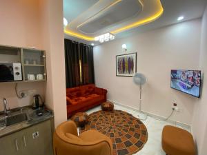 Televisyen dan/atau pusat hiburan di C7 Hazelwood Residence & Suites