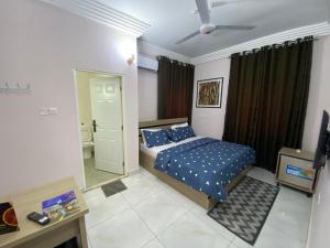 Katil atau katil-katil dalam bilik di C7 Hazelwood Residence & Suites