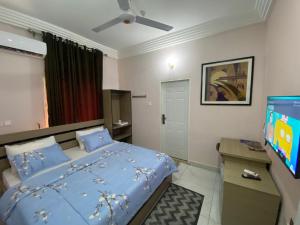 Katil atau katil-katil dalam bilik di C7 Hazelwood Residence & Suites