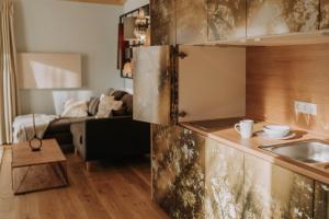 Waidlerland Waldkirchen Chalets客房内的一张或多张床位