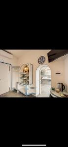 a kitchen with a counter and a plate on the wall at VILLA OLGA LUXURY CAPRI in Capri