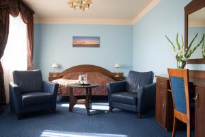 Posezení v ubytování Hotel Pasymowski