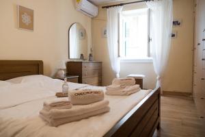 Posteľ alebo postele v izbe v ubytovaní Casa Chalichiopoulo, Corfu Town