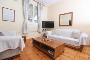 Televízia a/alebo spoločenská miestnosť v ubytovaní Casa Chalichiopoulo, Corfu Town