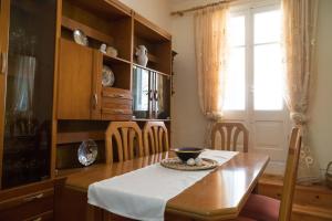 Televízia a/alebo spoločenská miestnosť v ubytovaní Casa Chalichiopoulo, Corfu Town
