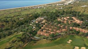 an aerial view of a resort near the ocean at Palmares Signature Apartments in Lagos
