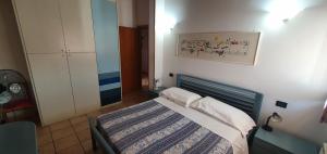 Postel nebo postele na pokoji v ubytování Albergo Primavera