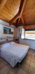 Postel nebo postele na pokoji v ubytování Albergo Primavera