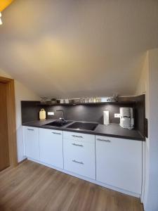 Kuchyň nebo kuchyňský kout v ubytování "Landhaus Kennerknecht"