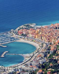 an aerial view of a beach and the ocean at Sablettes Beach-plage-vue mer-centre ville in Menton