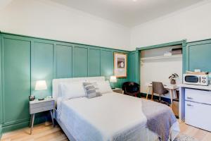 Lova arba lovos apgyvendinimo įstaigoje Suite 6 Historic Art City Inn