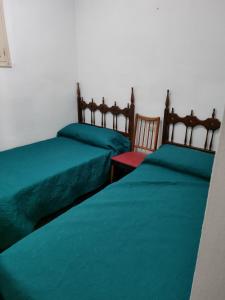 Postel nebo postele na pokoji v ubytování Estrella, 6º-40