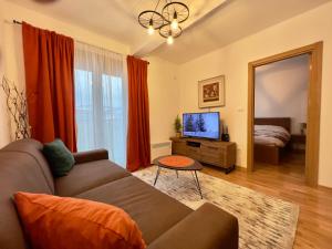 Et tv og/eller underholdning på Mima Apartment