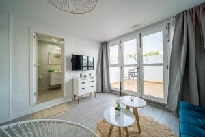 TV a/nebo společenská místnost v ubytování Apartamento Alisios Beach Puerto del Carmen