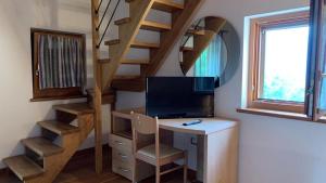 TV a/nebo společenská místnost v ubytování Casa Rosetta