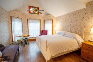 Voodi või voodid majutusasutuse Albergo Allegria Hotel & Breakfast Restaurant toas