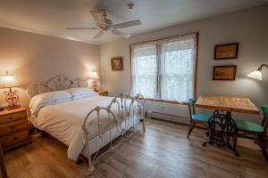 Voodi või voodid majutusasutuse Albergo Allegria Hotel & Breakfast Restaurant toas
