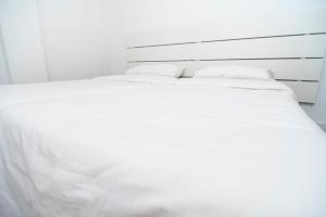 A bed or beds in a room at Alojamientos el Bajón