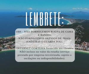 un signo que lee le meridien dominos roça de cana en 1028 - Bombinhas para aluguel de temporada - Residencial Areia Branca 201, en Bombinhas