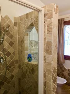 Ένα μπάνιο στο Reihenhaus Nr. 7 mit Pool und super Meersicht