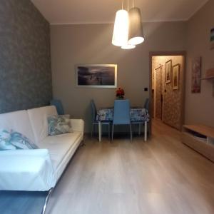 Posedenie v ubytovaní Appartamento Via Dei Glicini