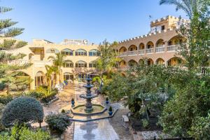 Vonkajšia záhrada v ubytovaní Hotel Plaza Del Castillo