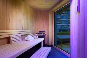 Hotel Tirol Fiss 4Sterne Superior客房内的一张或多张床位