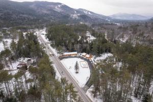 an aerial view of a road in the snow at The Inn & More in Bartlett