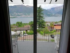 Fotografie z fotogalerie ubytování "Traumhafter Blick" auf Lago Maggiore und umliegende Berge v destinaci Gambarogno